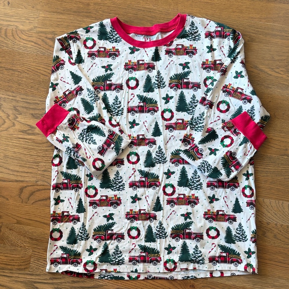 PJ Place Red and Green Holiday PJ Top and bottom.  Two sets of holiday pajamas.
